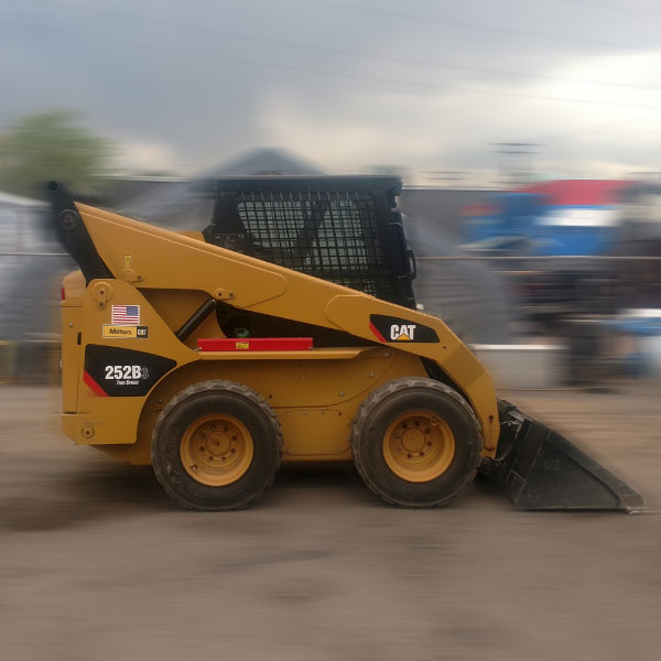 PRX Excavating in Denver, Colorado - Caterpillar 252B Skid Steer for hire excavation services
